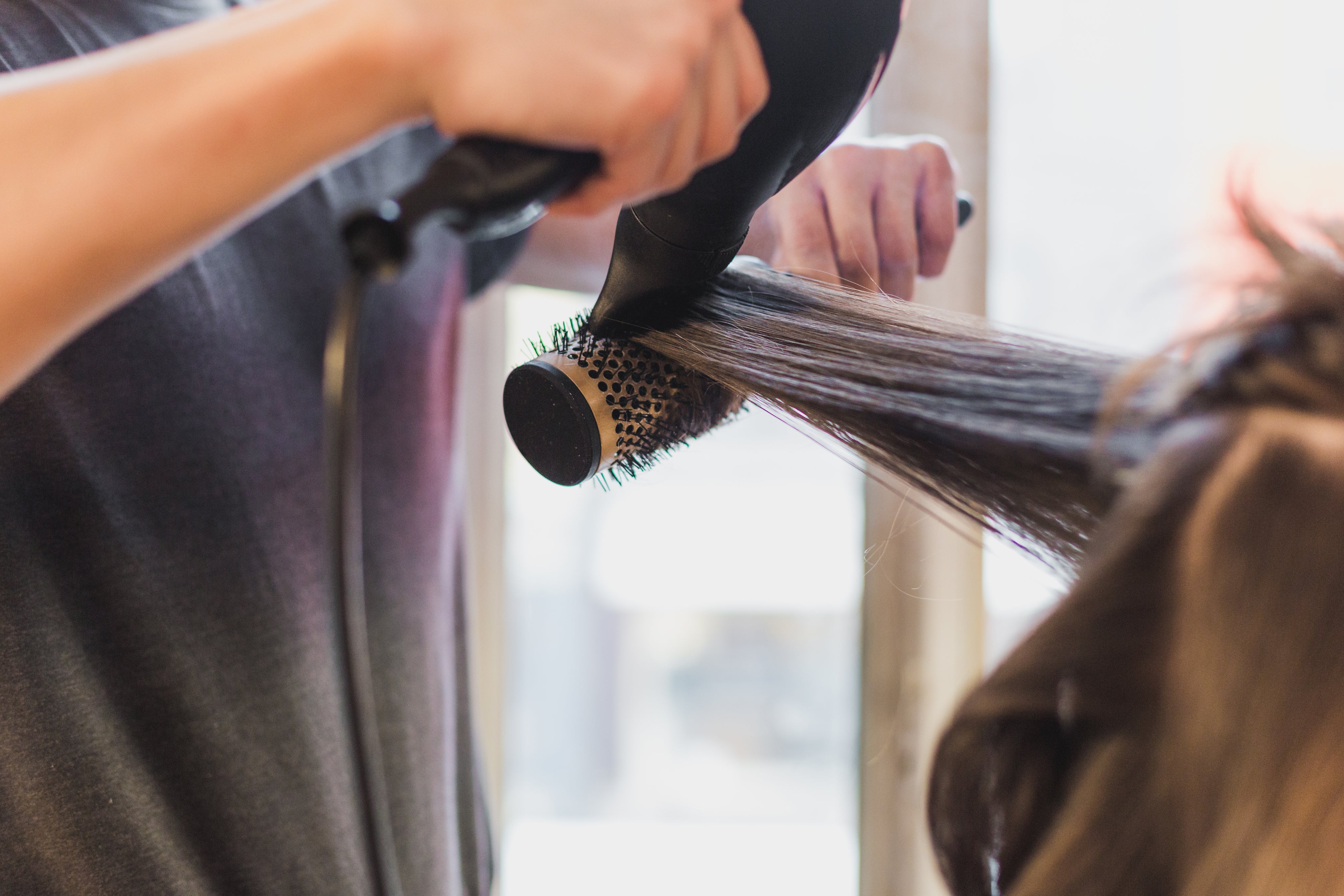 Blow-dry styling on a round brush at Crew Stylists, Queenstown