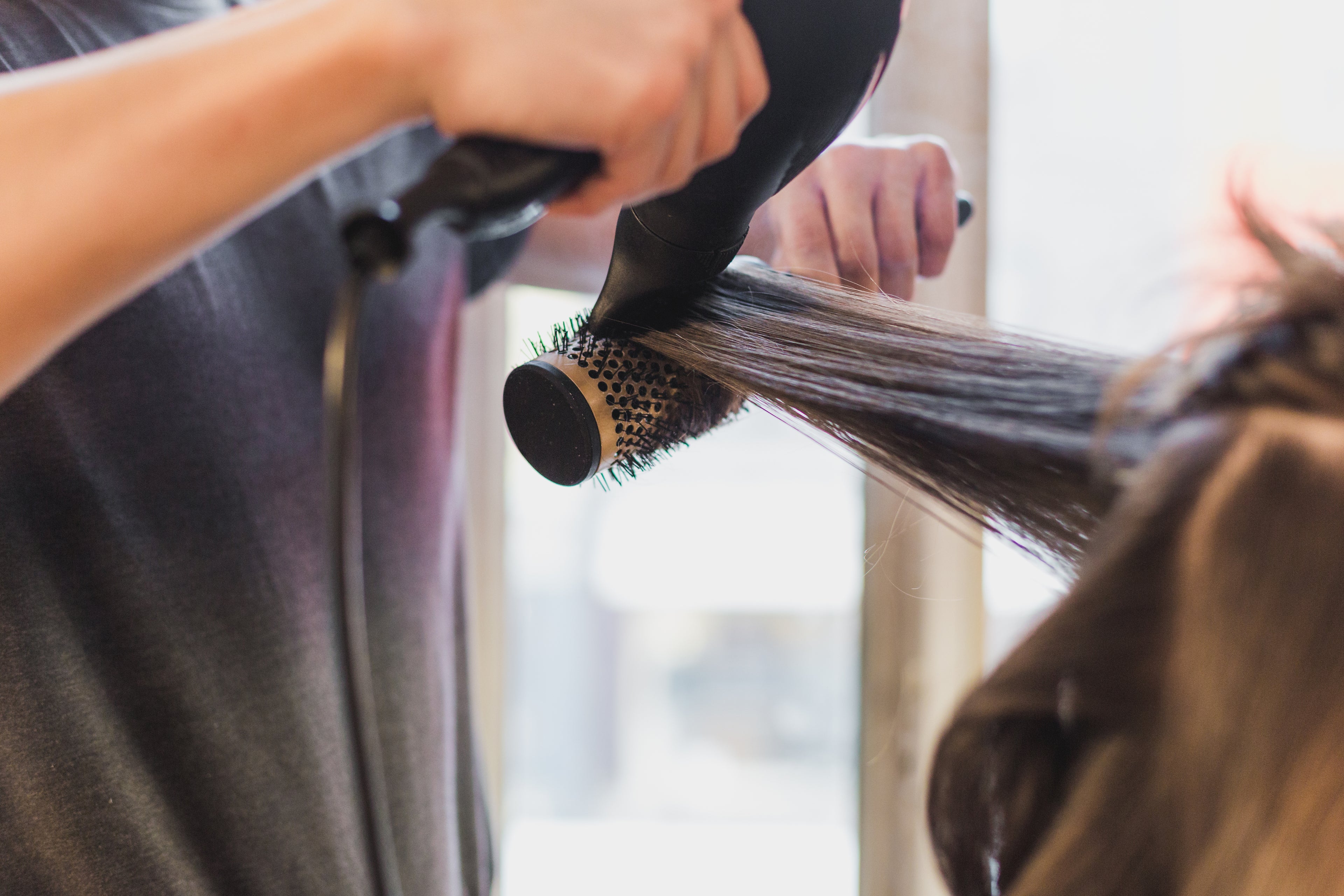 Blow-dry styling on a round brush at Crew Stylists, Queenstown