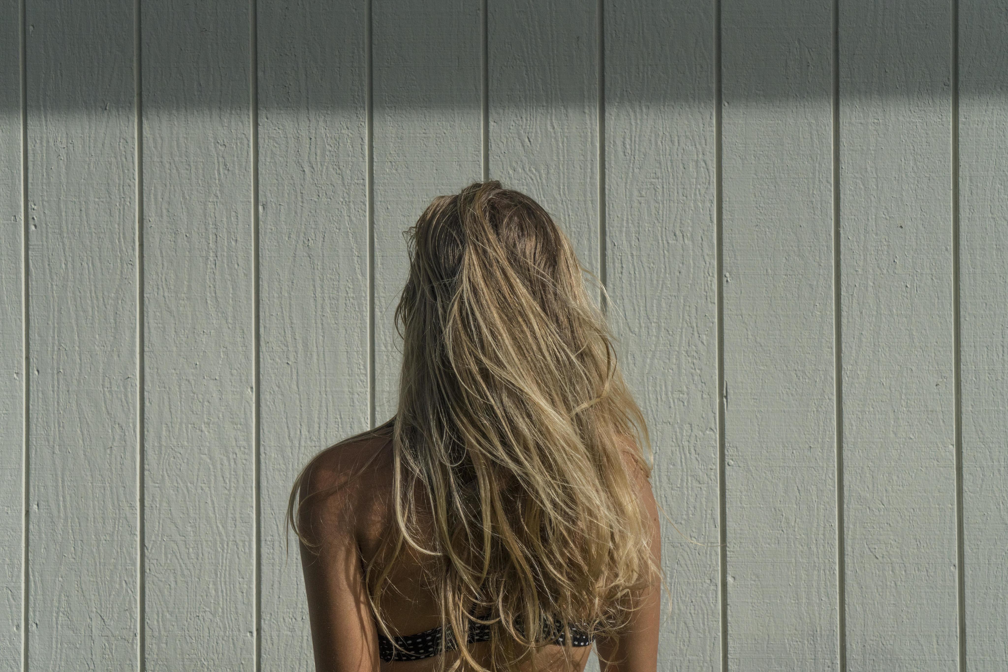 Long blonde hair styled by Crew Stylists, Queenstown